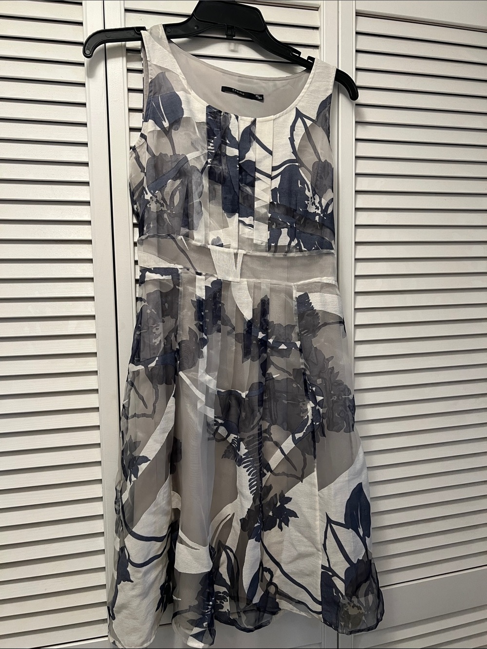 Sleeveless White Dress with Navy Floral Overlay